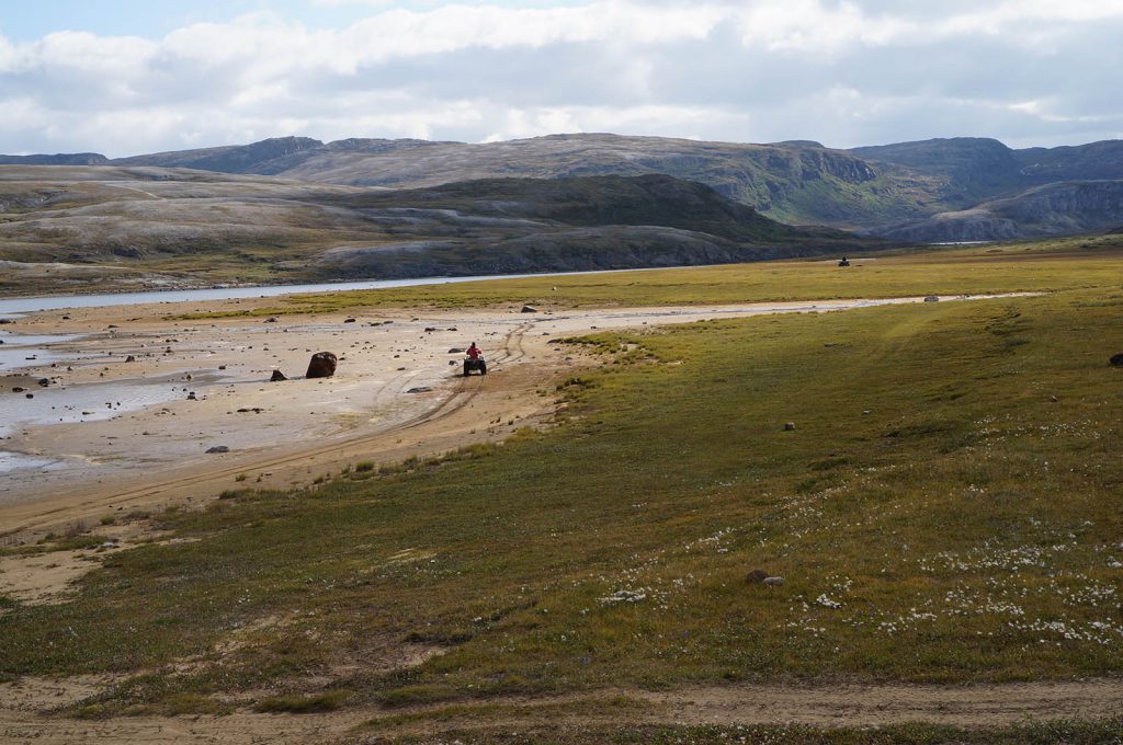 Inuit on ATVs on the Itijjagiaq Trail on Baffin Island