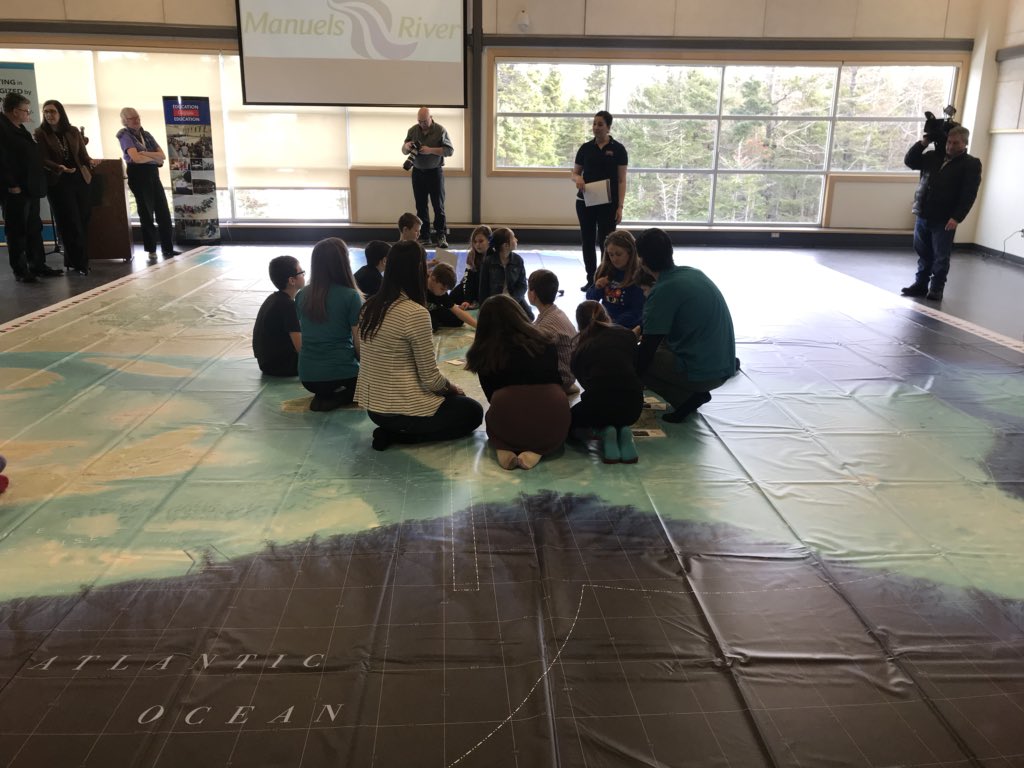 Students from Katie Bartlett’s Grade 4 class at Topsail Elementary in Conception Bay South, N.L., check out Can Geo Education's new Giant Floor Map of their province at Manuels River Hibernia Interpretation Centre on March 2.