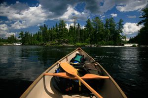 In Quetico, a canoeist approaches the fabled Falls Chain