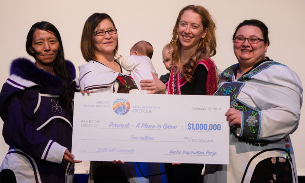 Members of the Pirurvik project accepting their award