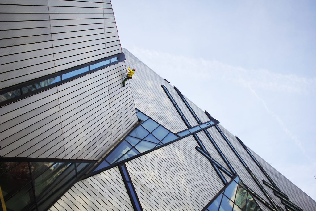 Rock climber Kevin Jorgeson scales the Michael Lee-Chin Crystal at the Royal Ontario Museum in Toronto on October 26.