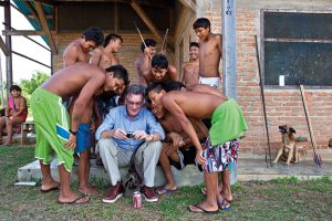 World traveller Michael Palin shares snaps with locals at the Demini airstrip while working on his latest project, Brazil.